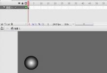 flash cs3怎么利用补间动画制作小球边隐边显效果?
